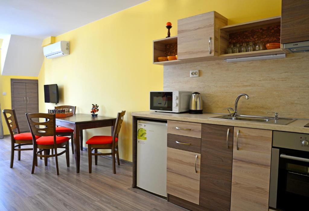 Kuchyň nebo kuchyňský kout v ubytování Visito Aparthouse