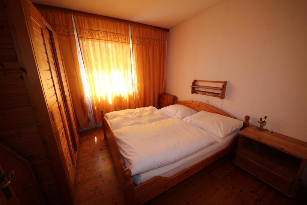 Postel nebo postele na pokoji v ubytování Hotel Kleinmünchen