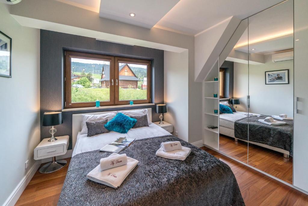 Posteľ alebo postele v izbe v ubytovaní Polana Szymoszkowa Ski Resort - My Dream Apartment