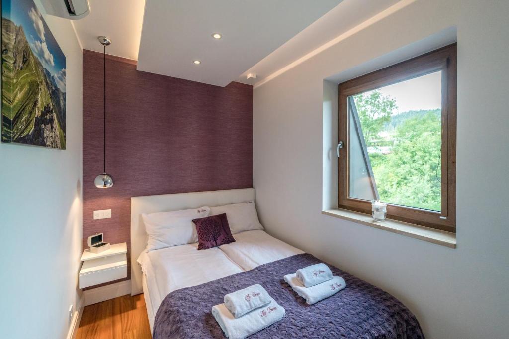 Posteľ alebo postele v izbe v ubytovaní Polana Szymoszkowa Ski Resort - My Dream Apartment
