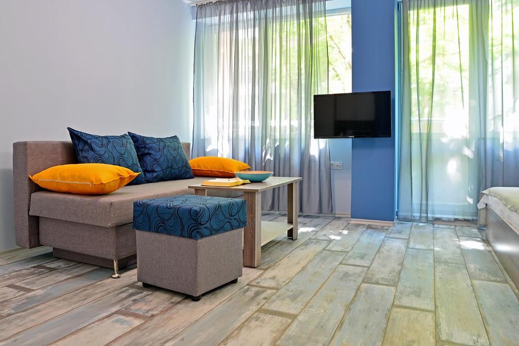 TV a/nebo společenská místnost v ubytování Visito Aparthouse