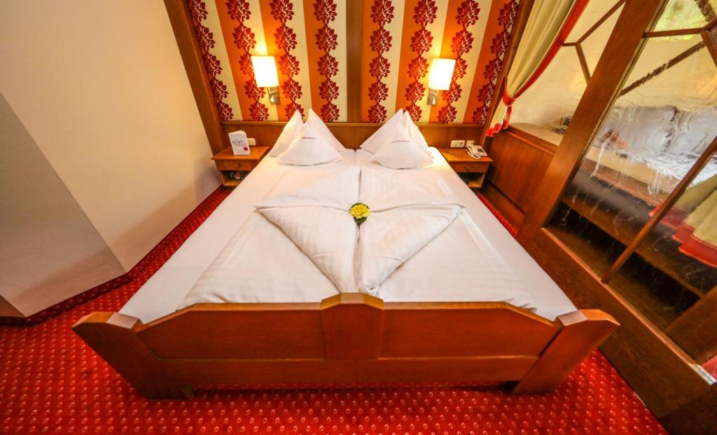 Een bed of bedden in een kamer bij Kolmhof