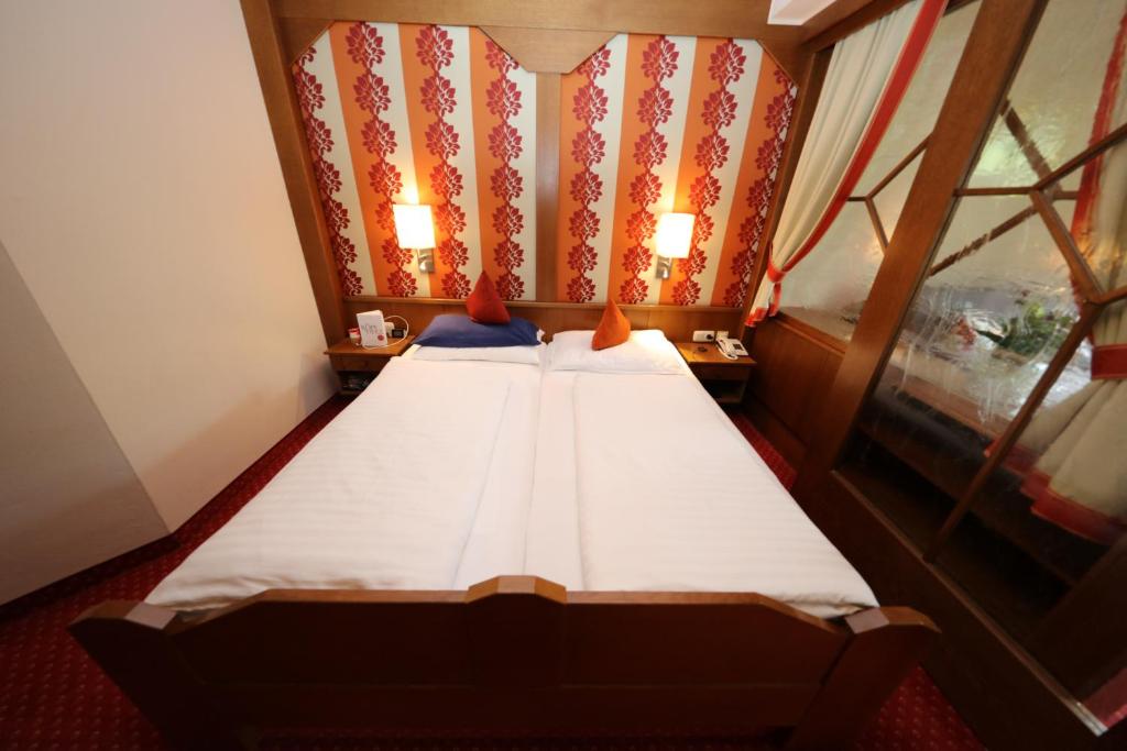 Een bed of bedden in een kamer bij Kolmhof