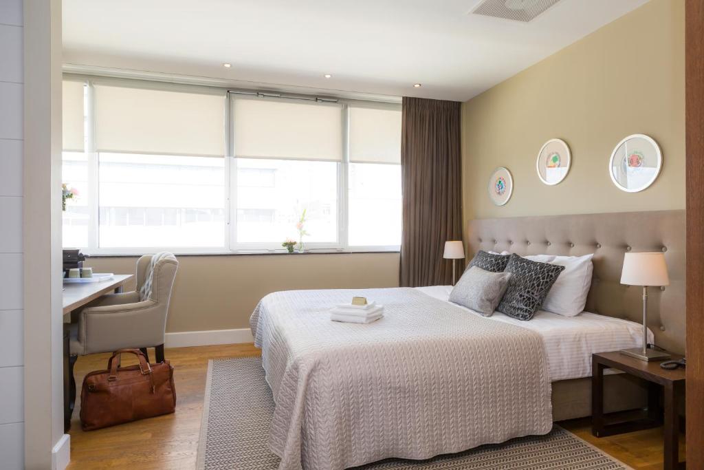 Postel nebo postele na pokoji v ubytování Boutique Hotel Lumiere