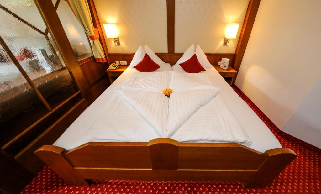 Een bed of bedden in een kamer bij Kolmhof