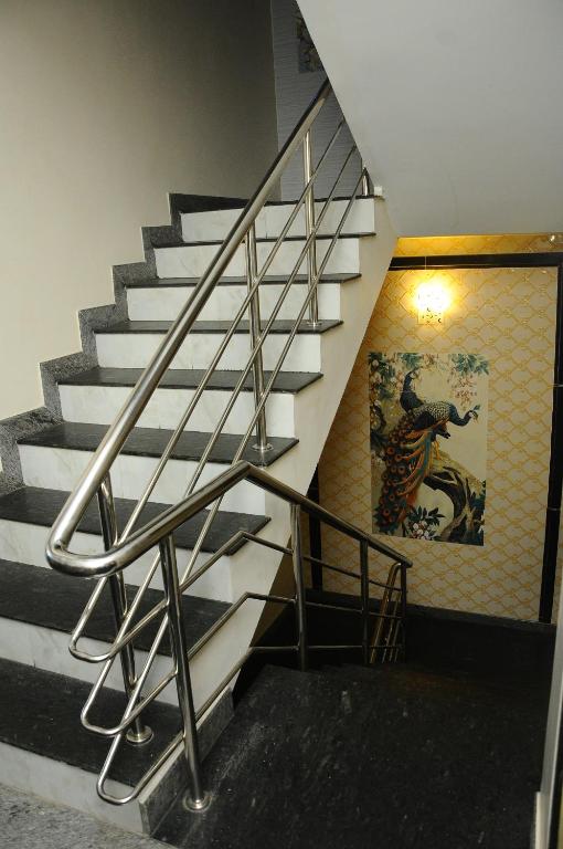 Fotografie z fotogalerie ubytování Hotel Lovely Nest v destinaci Kójamputtúr