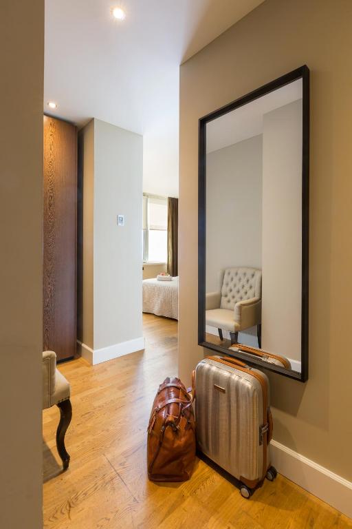 Postel nebo postele na pokoji v ubytování Boutique Hotel Lumiere