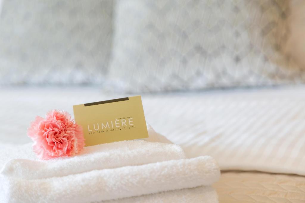 Postel nebo postele na pokoji v ubytování Boutique Hotel Lumiere