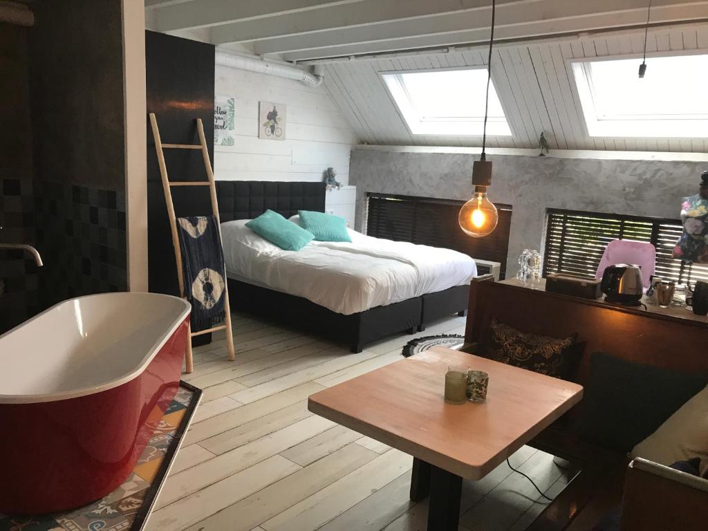 Кровать или кровати в номере B&B de Petrakerk
