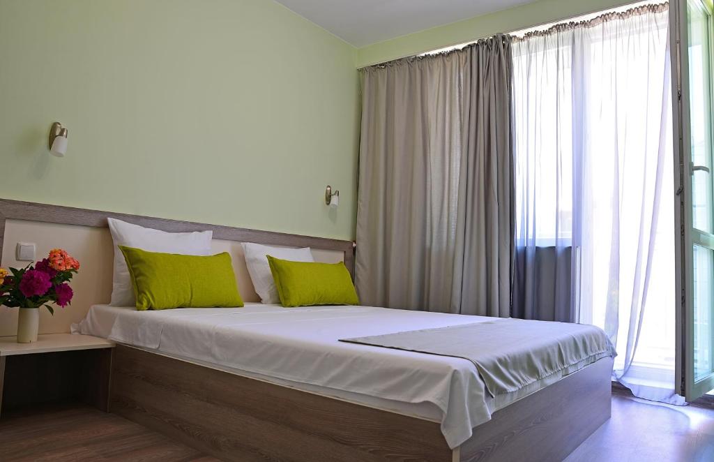 Postel nebo postele na pokoji v ubytování Visito Aparthouse