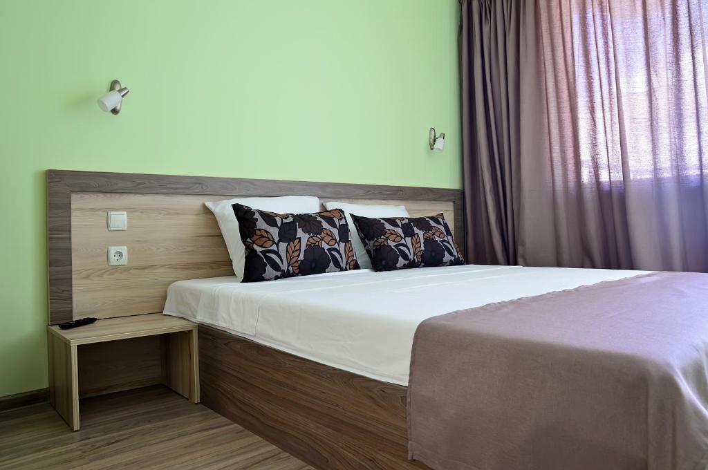 Postel nebo postele na pokoji v ubytování Visito Aparthouse
