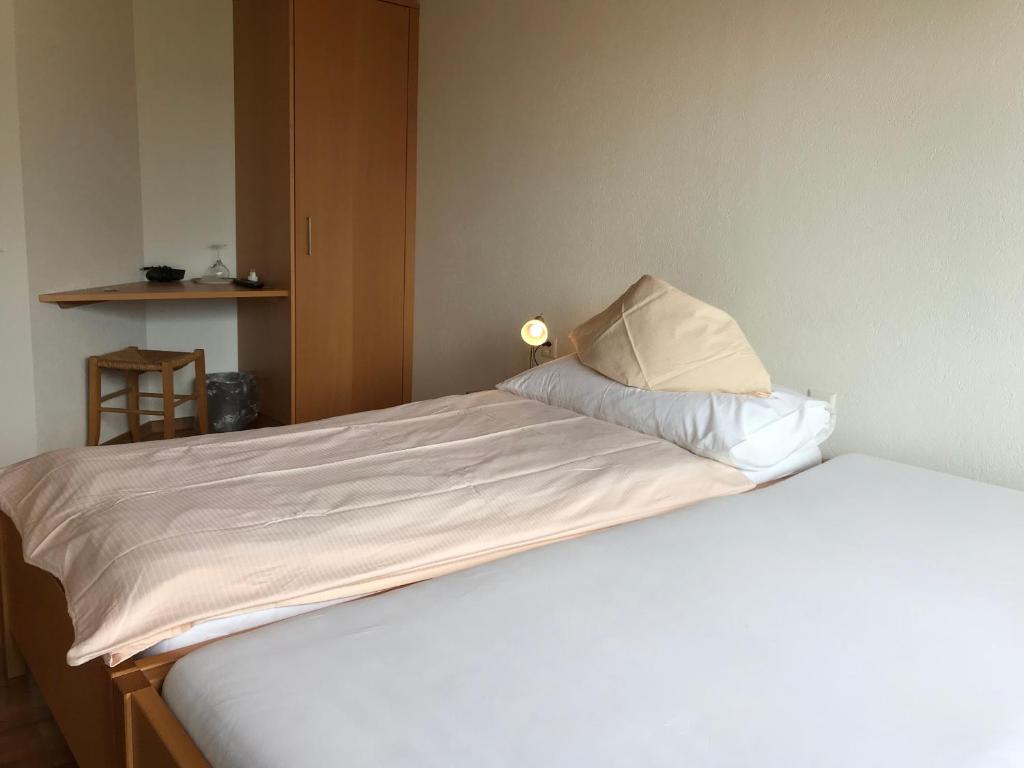 Postel nebo postele na pokoji v ubytování Bed and Breakfast Krone
