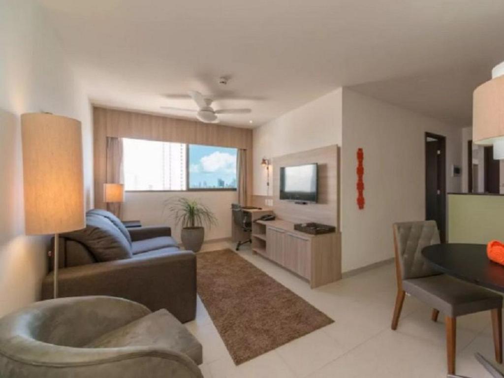 Khu vực ghế ngồi tại Excelente Flat em Boa Viagem 2 quartos Beach Class Ideal para Família ou Viagens de Negócio NOB1804