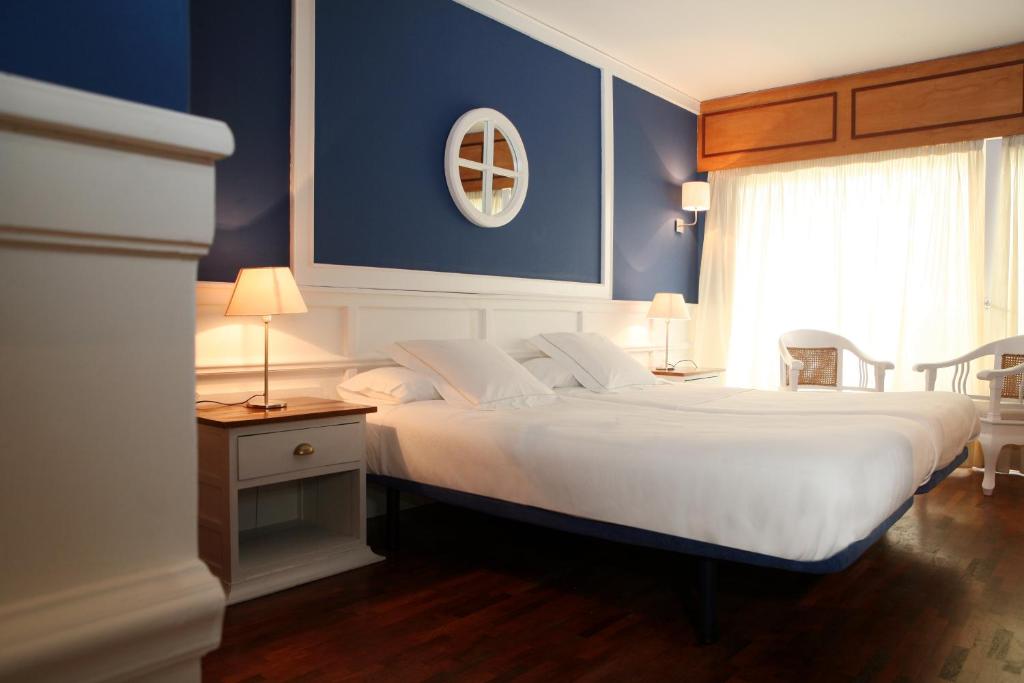 Cama o camas de una habitación en Hotel Vostra Llar