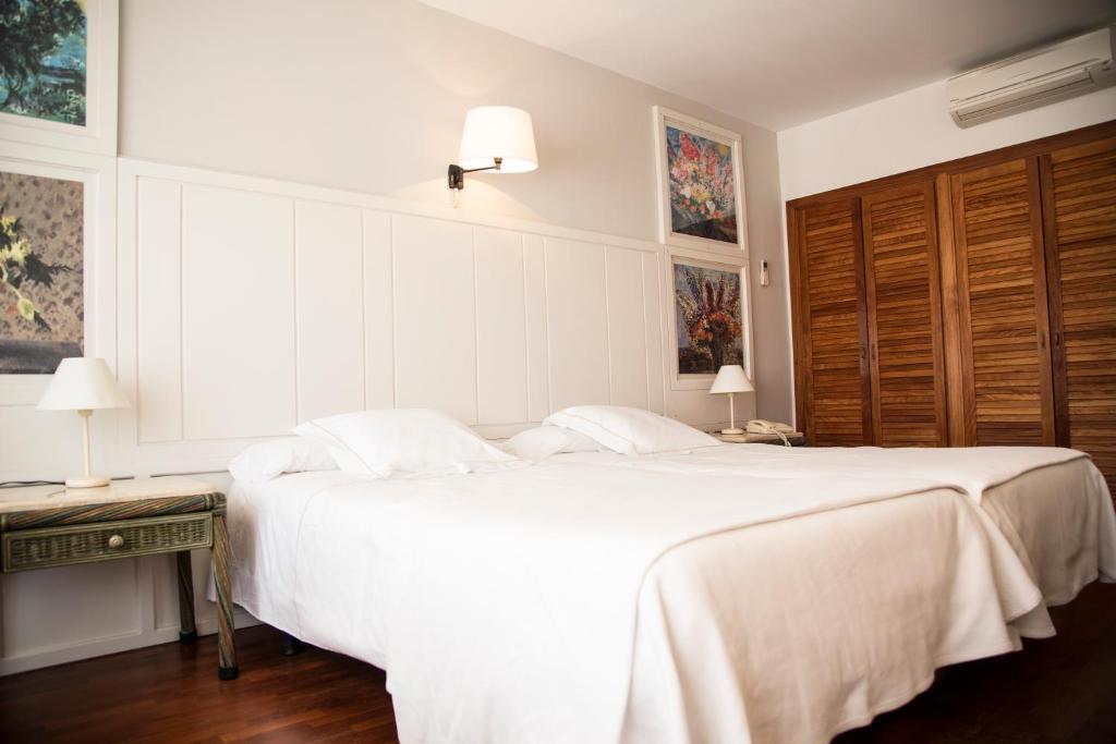 Posteľ alebo postele v izbe v ubytovaní Hotel Vostra Llar