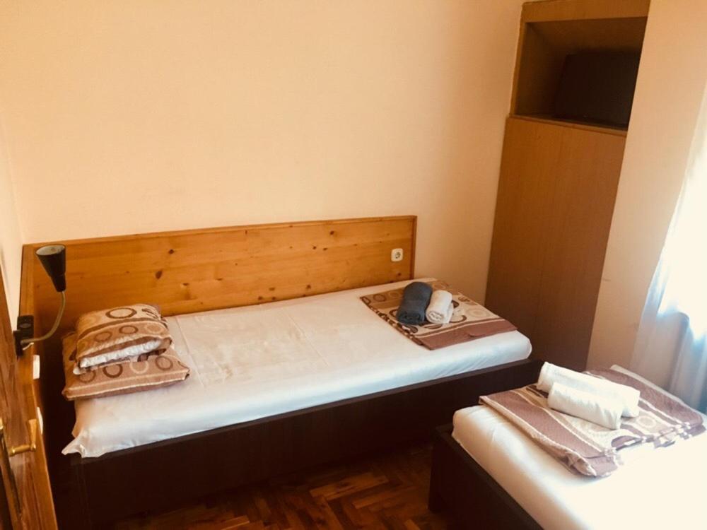 Postel nebo postele na pokoji v ubytování Rózsakert Panzió