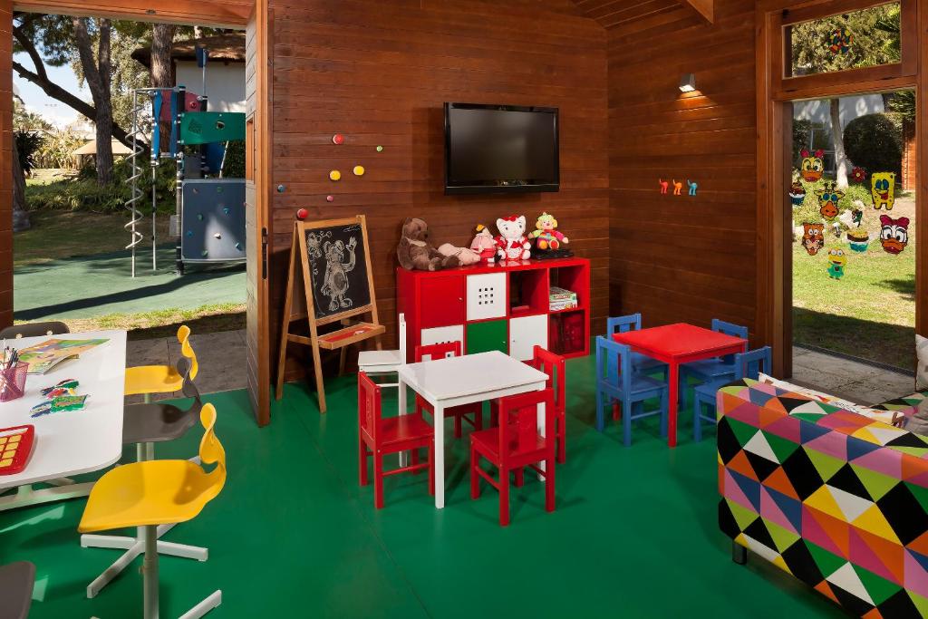 a toy house with a table and chairs at Hotel Don Pepe Gran Meliá in Marbella