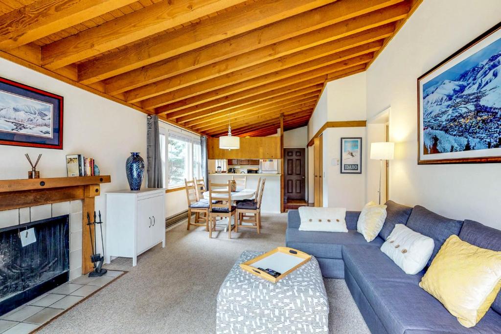 a living room with a couch and a fireplace at Sun Valley Serenity in Sun Valley