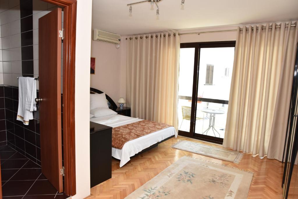 Postel nebo postele na pokoji v ubytování Guest House Evropa