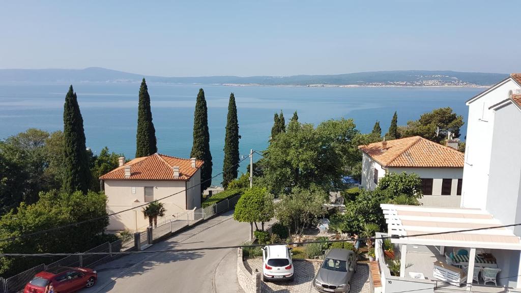 a street in a town with a view of the water at Villa Crikvenica in Crikvenica