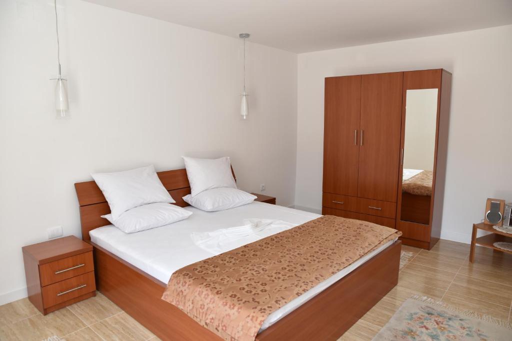 Postel nebo postele na pokoji v ubytování Guest House Evropa