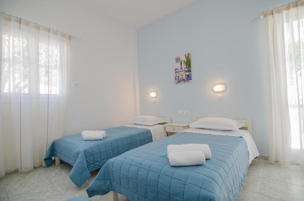 Athena Rooms客房内的一张或多张床位