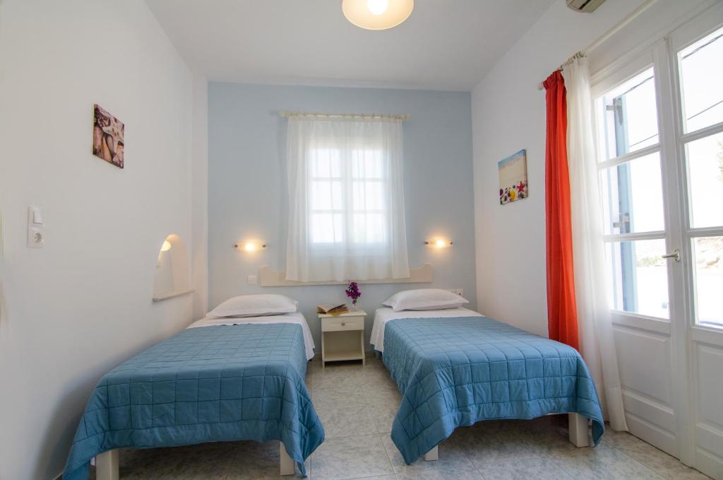 Athena Rooms客房内的一张或多张床位