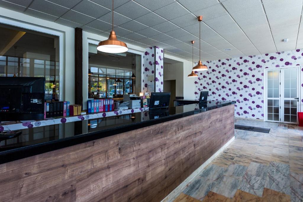 Lounge nebo bar v ubytování Complejo Roma