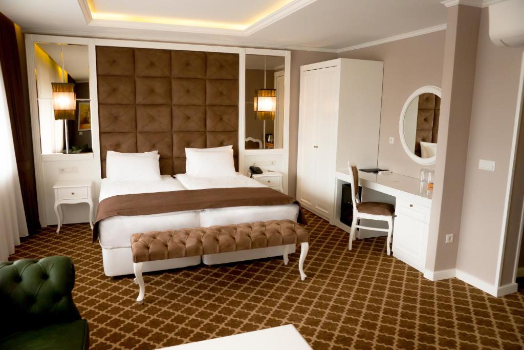 Postel nebo postele na pokoji v ubytování Hotel Arpezos