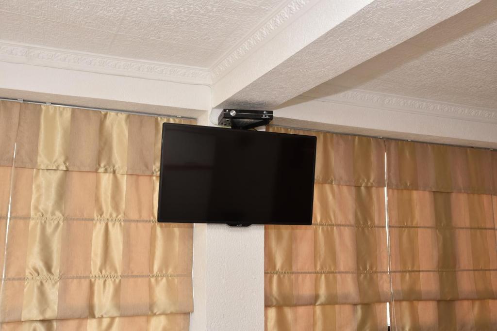 TV a/nebo společenská místnost v ubytování Guest House Evropa