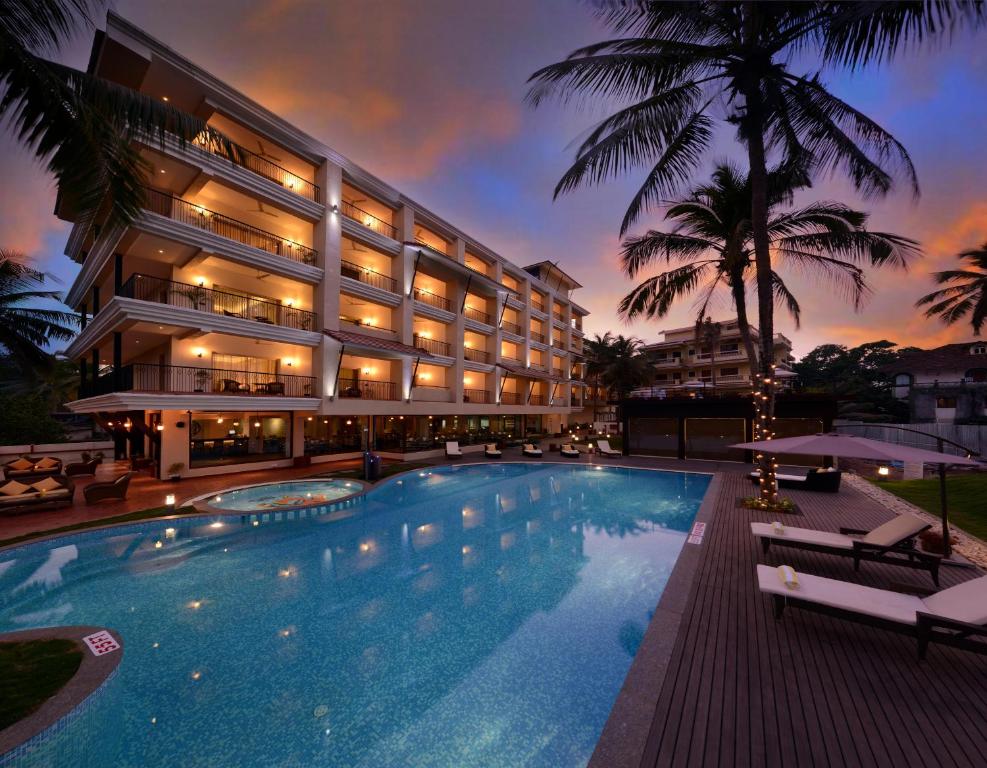 Bazén v ubytování Golden Tulip Candolim, Goa nebo v jeho okolí