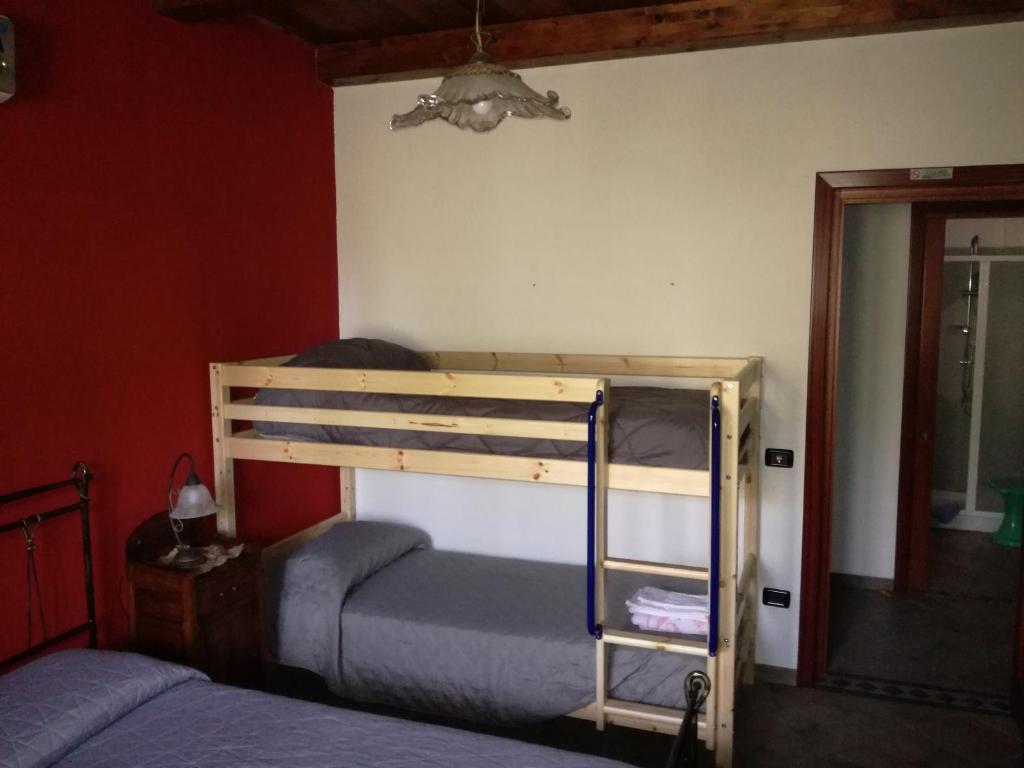 Posteľ alebo postele v izbe v ubytovaní B&B funtanadetalia