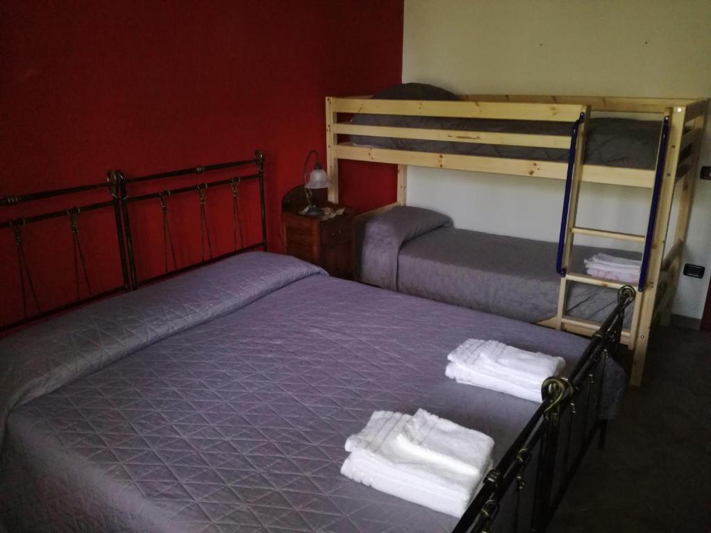 Posteľ alebo postele v izbe v ubytovaní B&B funtanadetalia