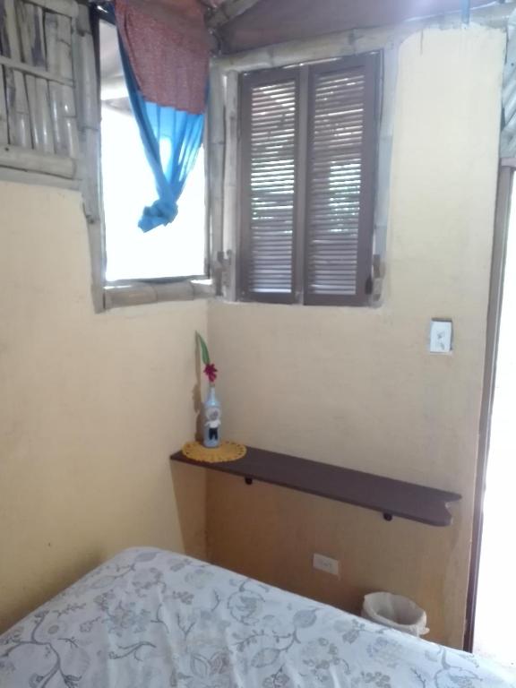 Postel nebo postele na pokoji v ubytování Hostal Familiar El Ángel Panamá B&B