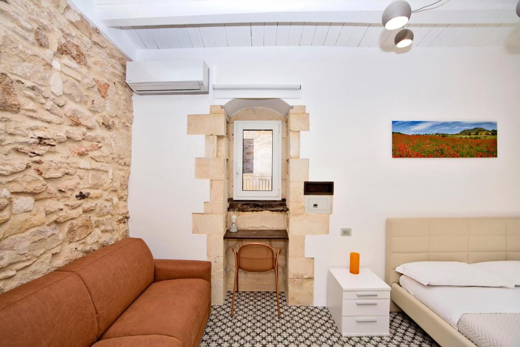 Postel nebo postele na pokoji v ubytování B&B Bianco E Blu