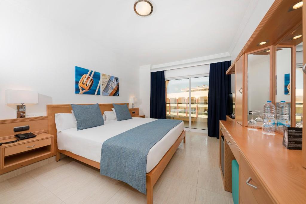 Cama o camas de una habitación en Ukino Palmeiras Village - 24h All Inclusive