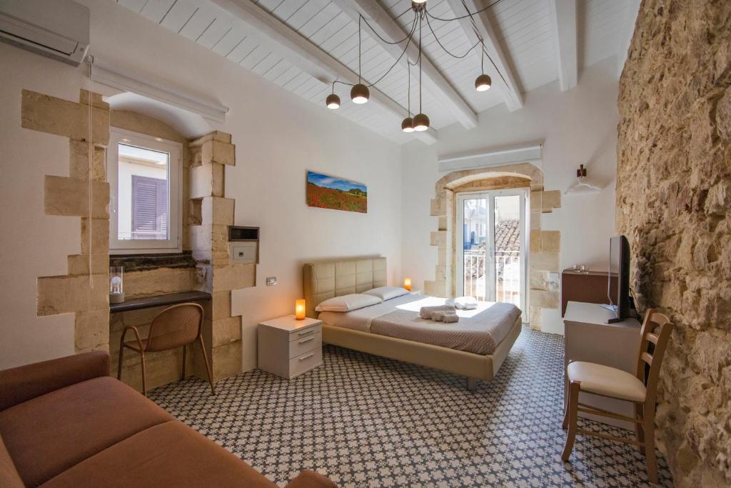 Postel nebo postele na pokoji v ubytování B&B Bianco E Blu