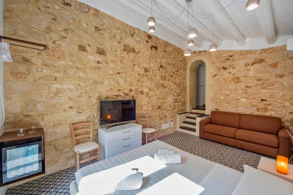 Posezení v ubytování B&B Bianco E Blu
