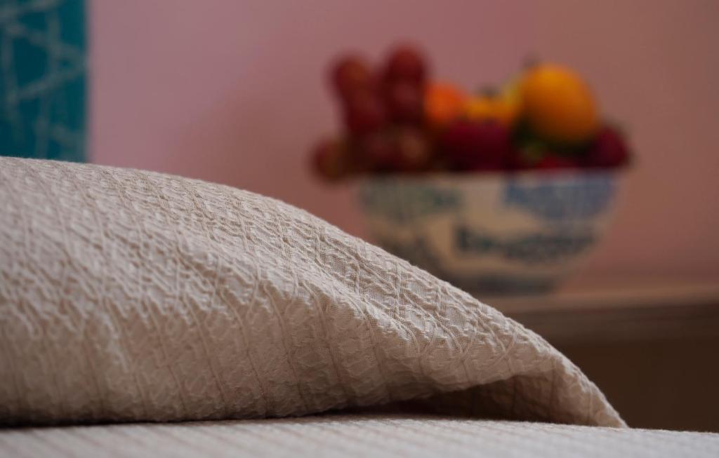 Postel nebo postele na pokoji v ubytování Ai Pesci Room Rental