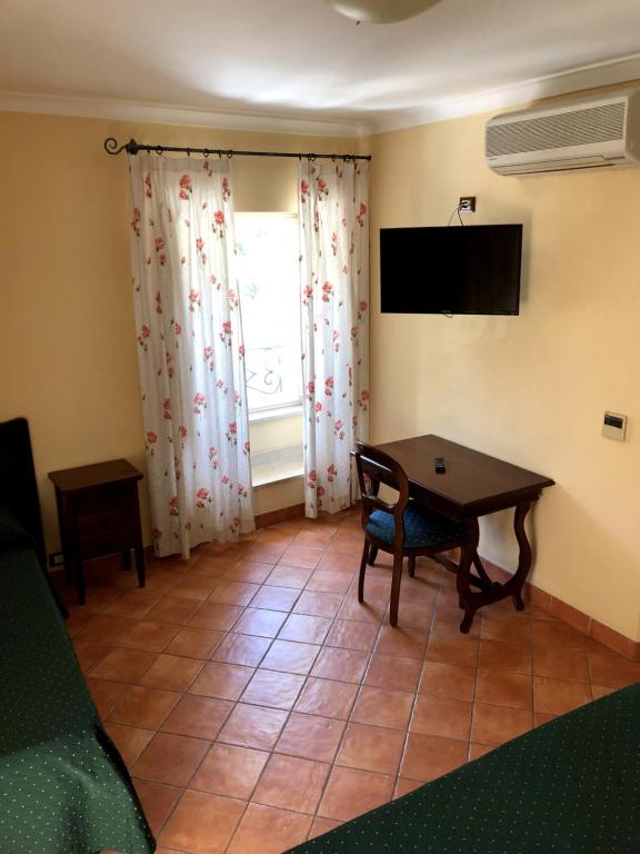 TV a/nebo společenská místnost v ubytování Apollo B&B