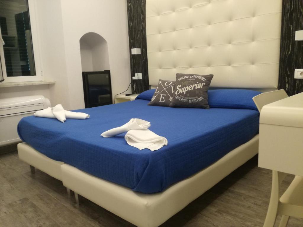 Postel nebo postele na pokoji v ubytování Zia Rita
