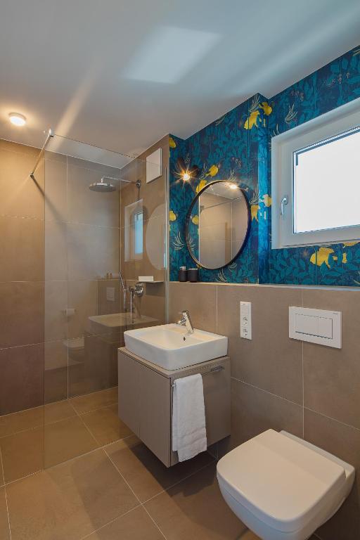 Koupelna v ubytování DD Suites Serviced Apartments