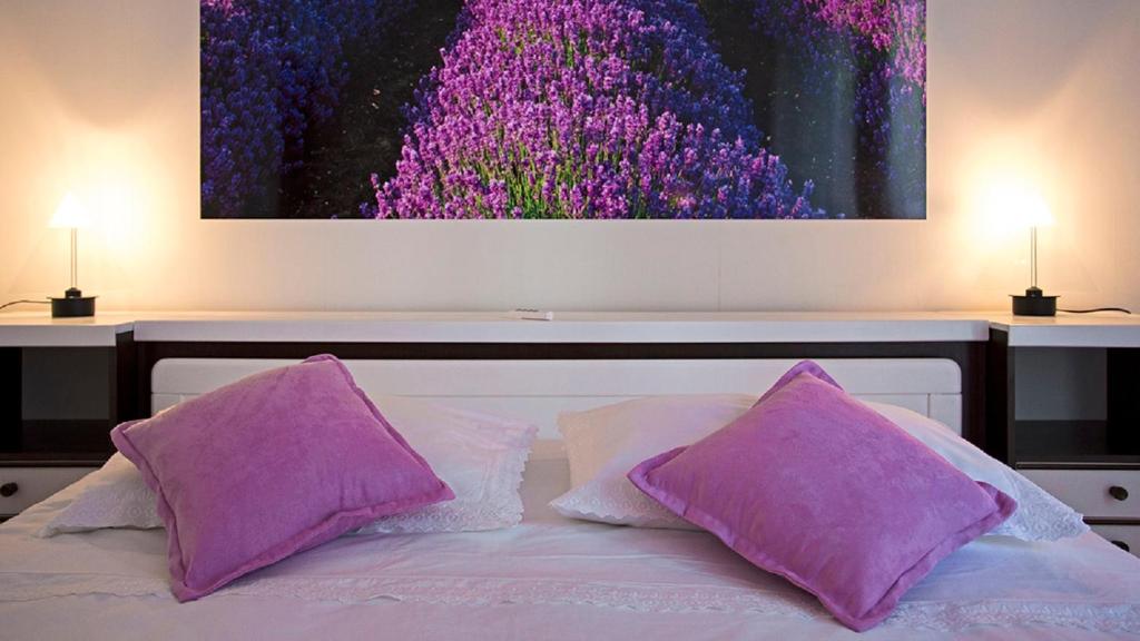 Postel nebo postele na pokoji v ubytování Apartment Milana - Cozy Stay with Free Parking