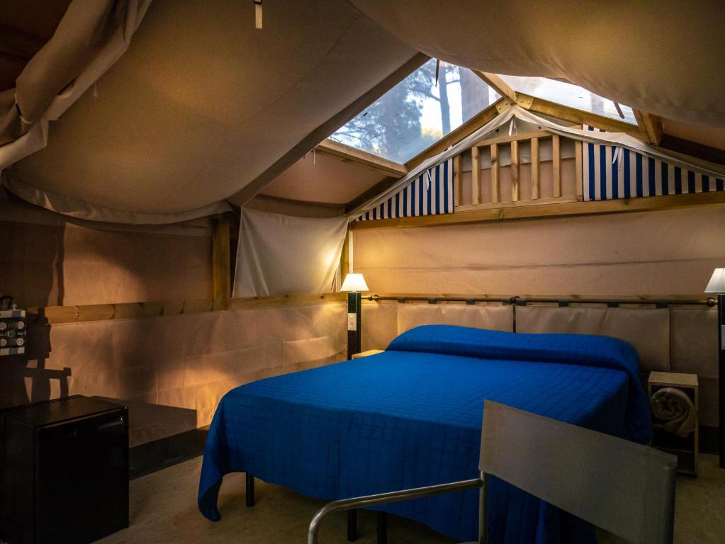 Postel nebo postele na pokoji v ubytování Camping Free Beach