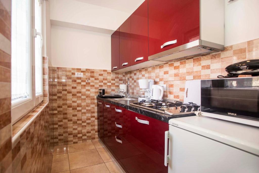 Kuchyň nebo kuchyňský kout v ubytování Apartman Barbara