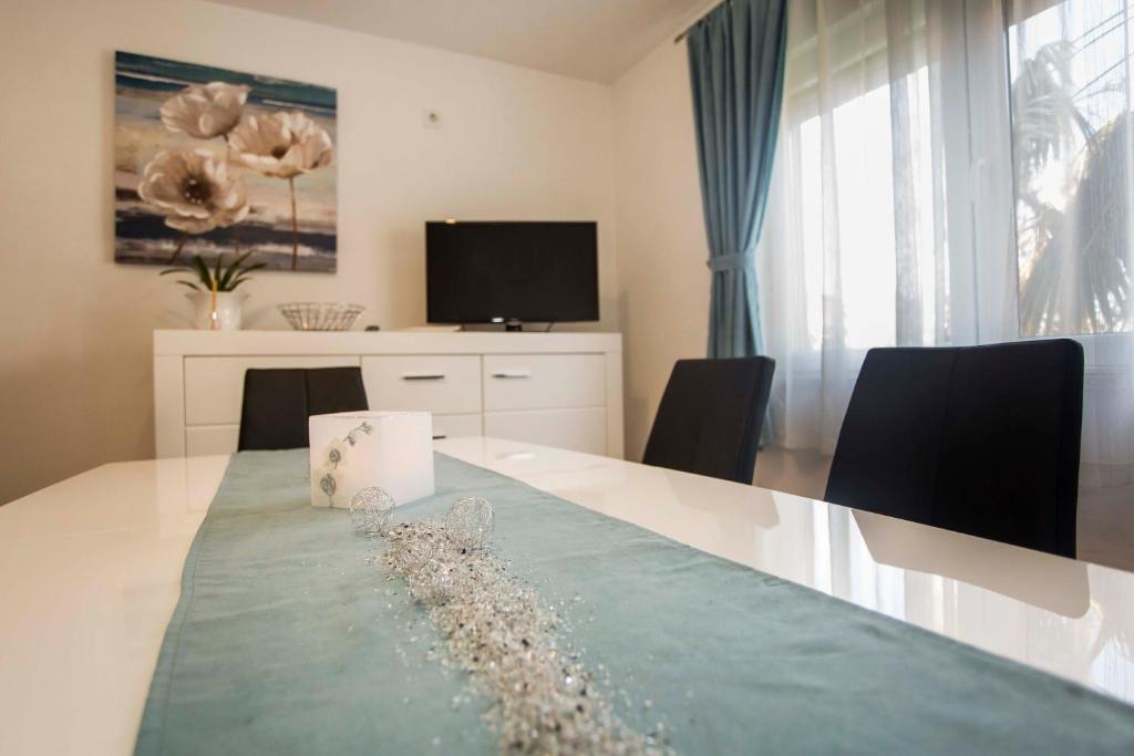 TV a/nebo společenská místnost v ubytování Apartman Barbara