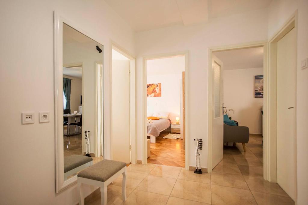 Postel nebo postele na pokoji v ubytování Apartman Barbara