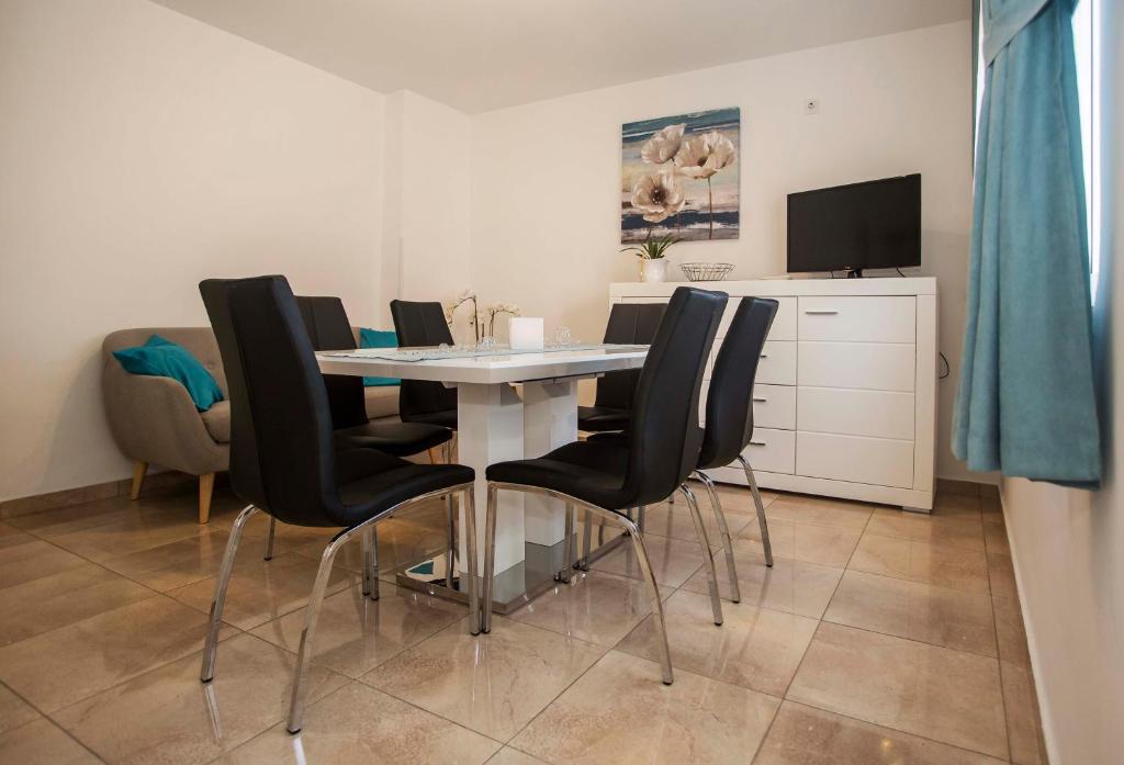 TV a/nebo společenská místnost v ubytování Apartman Barbara