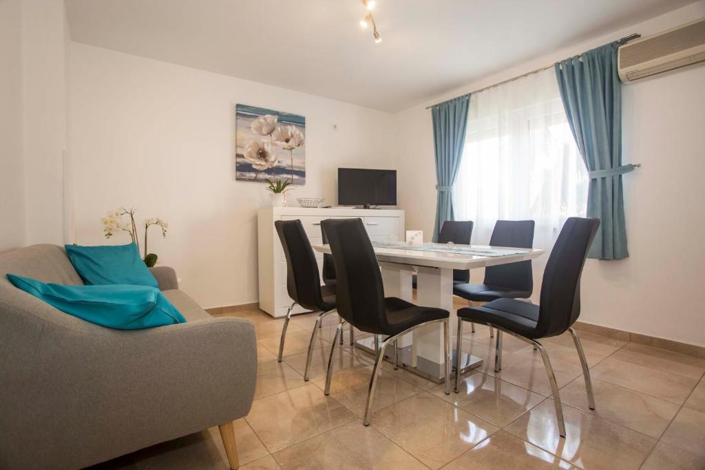 TV a/nebo společenská místnost v ubytování Apartman Barbara