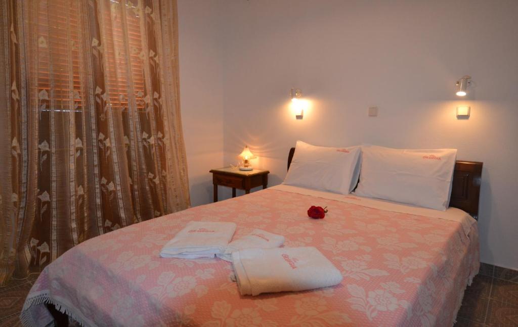 Postel nebo postele na pokoji v ubytování Villa Georgia